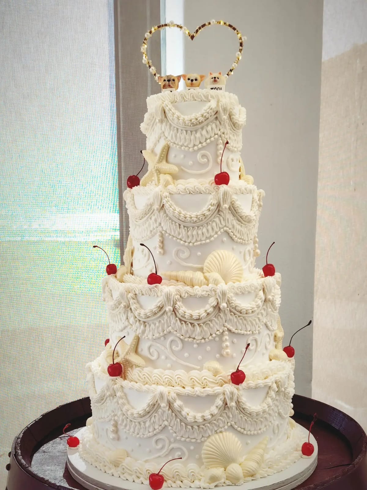 Ornate three-tier wedding cake
