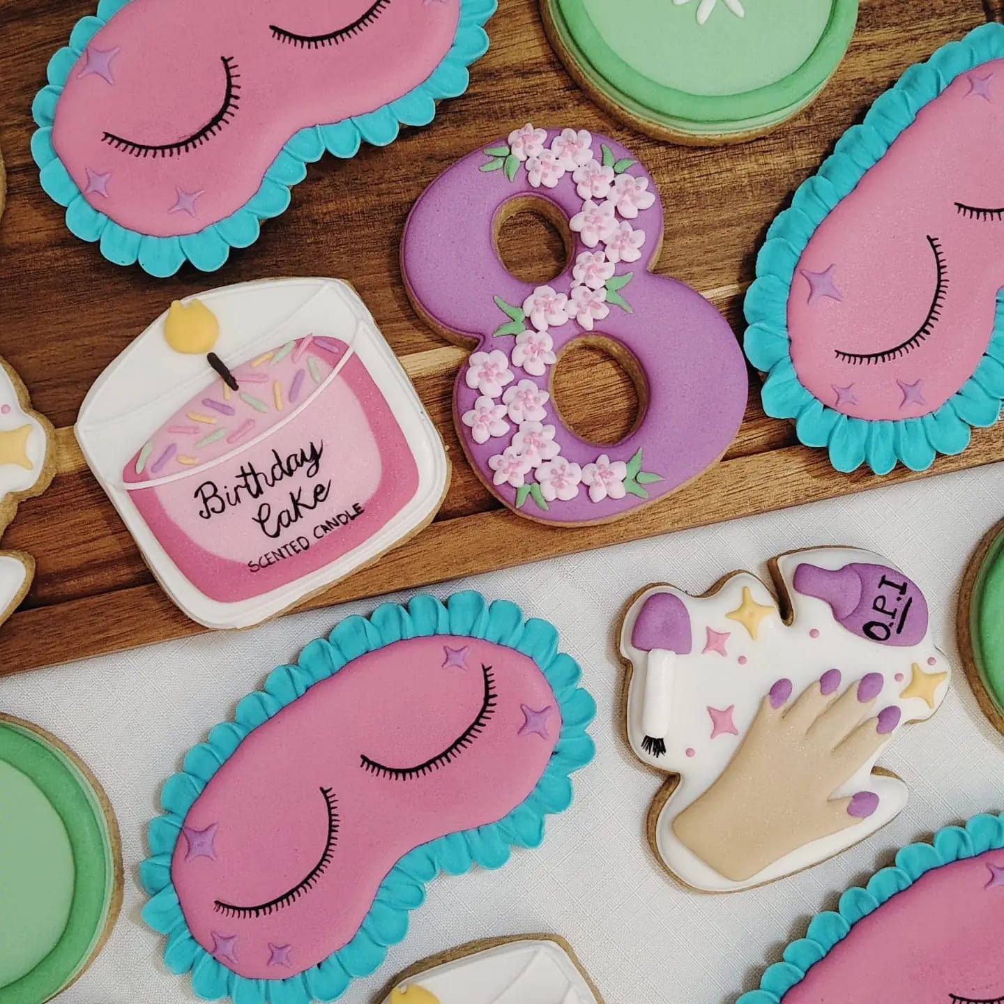 Colourful royal icing cookies made for a themed celebration